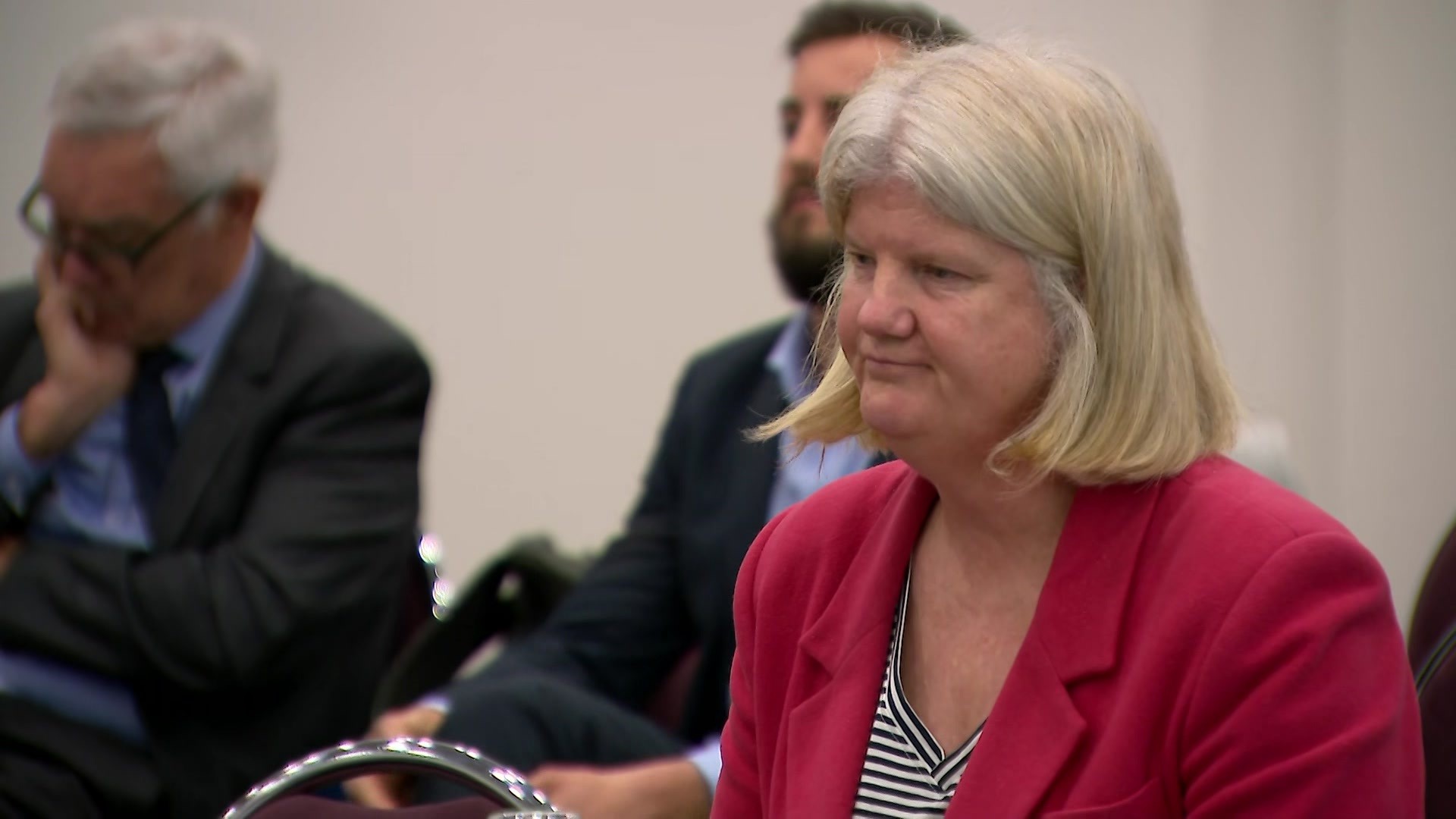 Lisa Hasker appears before a Senate inquiry