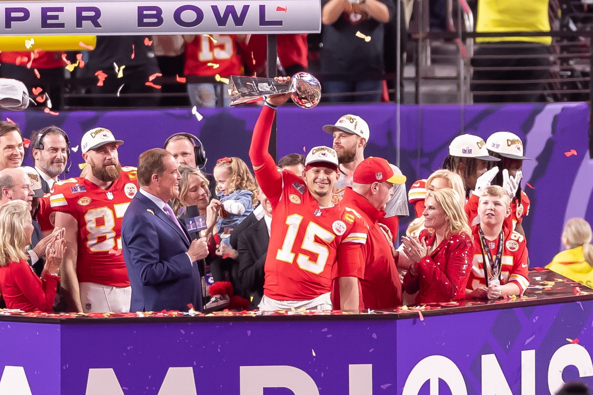 Kansas City Chiefs quarterback Patrick Mahomes holds the Vince Lombardi Trophy after Super Bowl LVIII.
