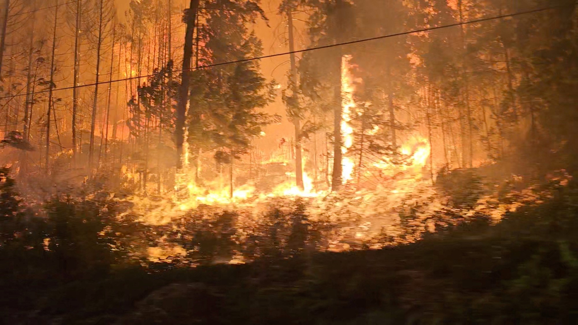 A view of fire close to highway near Sorrento, British Columbia, Canada