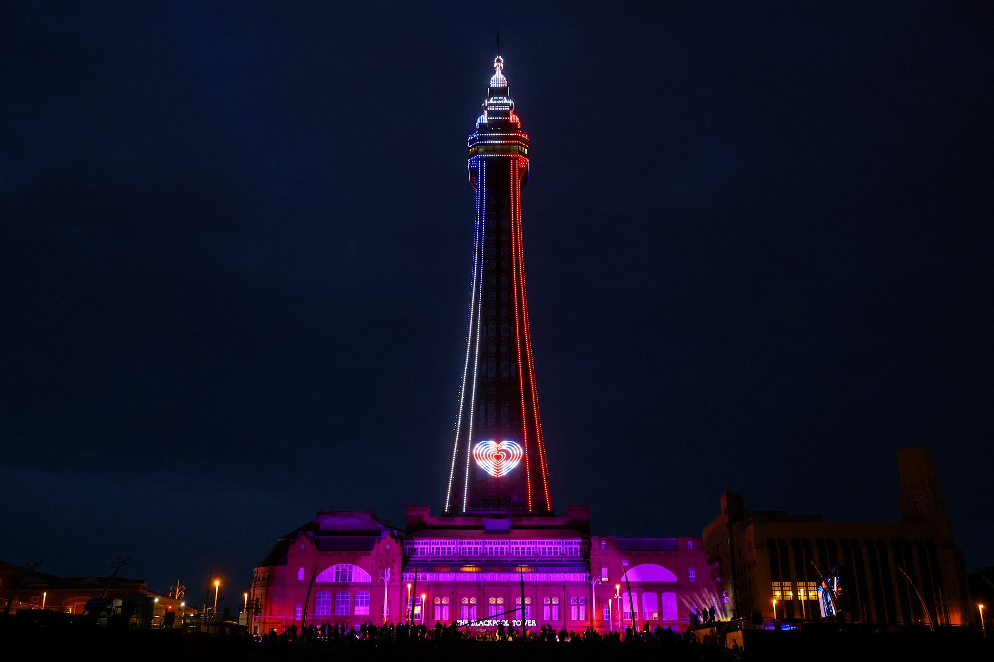 The Blackpool Tower lit up un blue and red.