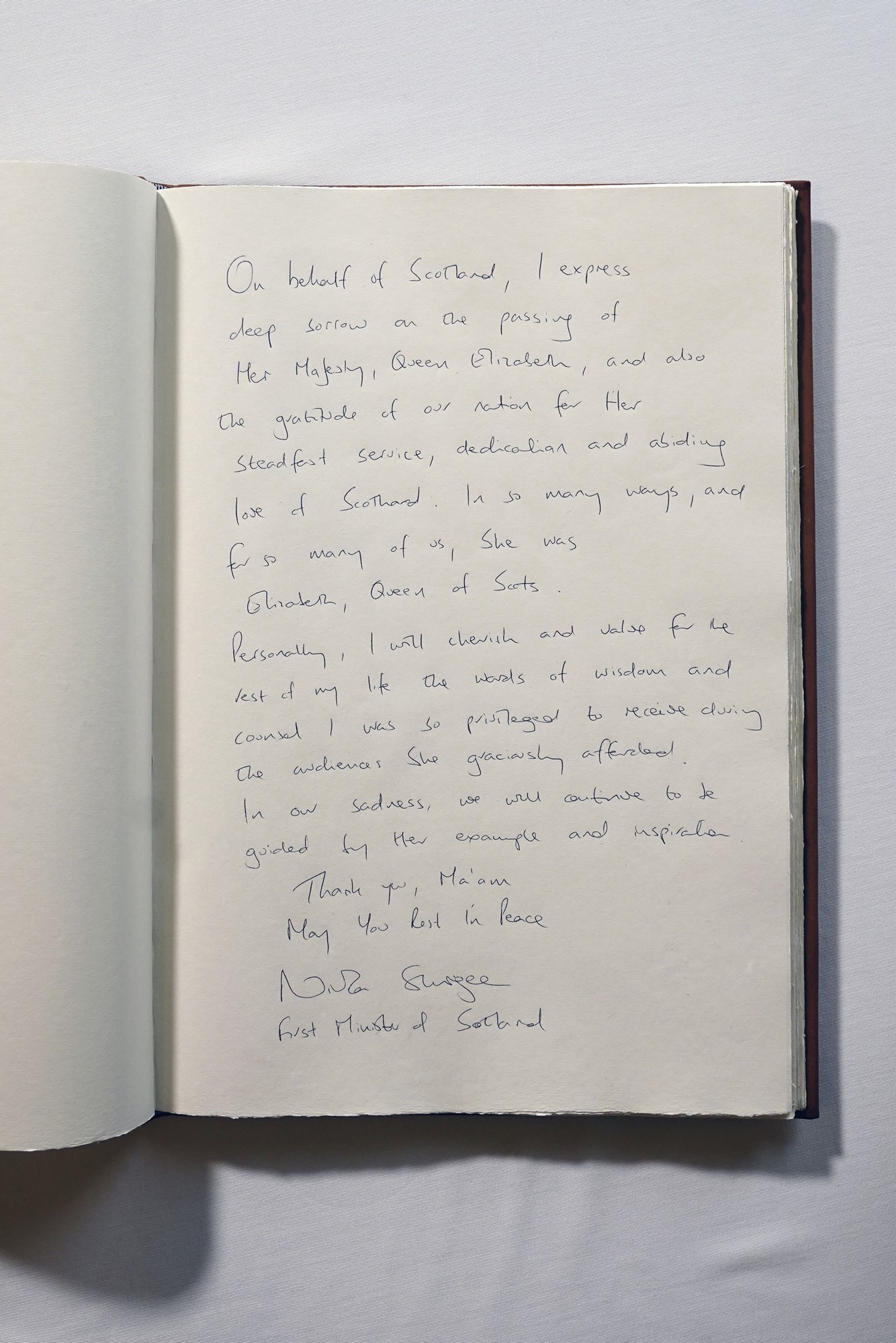 A message written by First Minister Nicola Sturgeon in a book of condolence for Queen Elizabeth II is pictured at Bute House in Edinburgh, Friday Sept. 9, 2022.