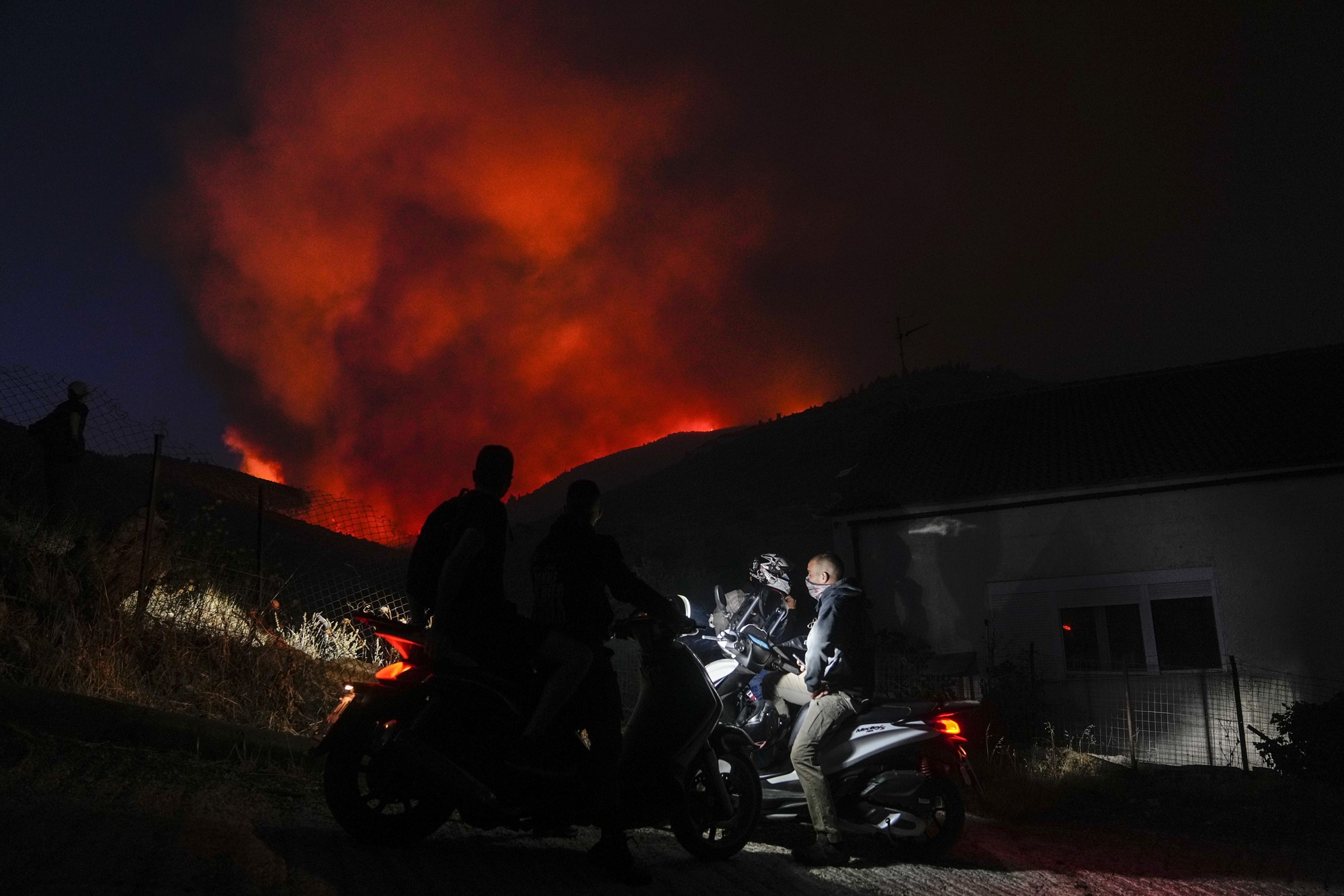 A wildfire burns near Athens.