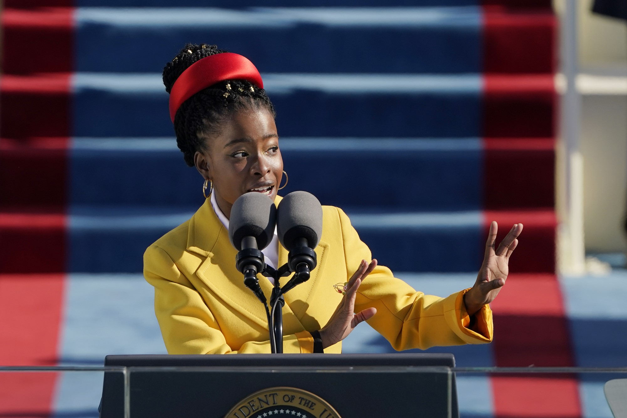 A black woman speaks at a podium during Joe Biden's inauguration