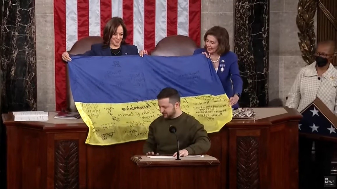 A Ukrainian flag is given to Congress.