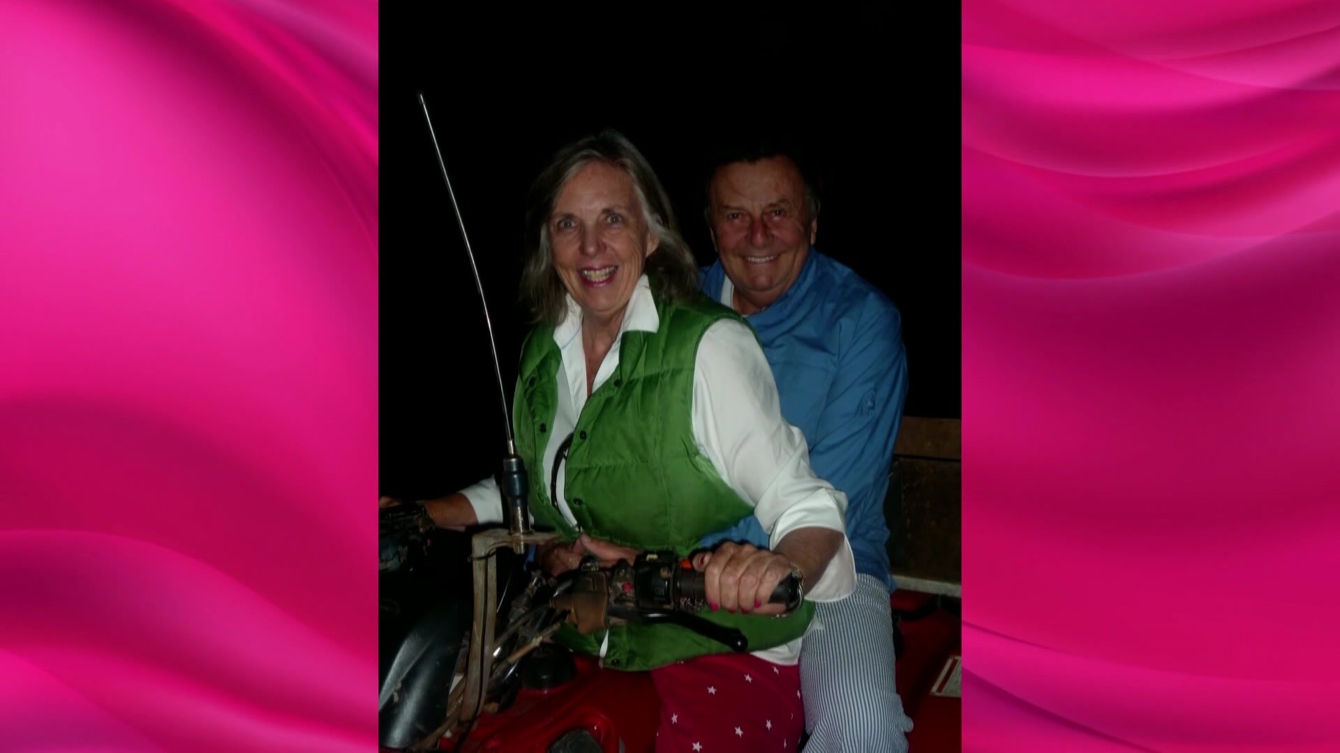 Barry Humphries and his wife on a bike.