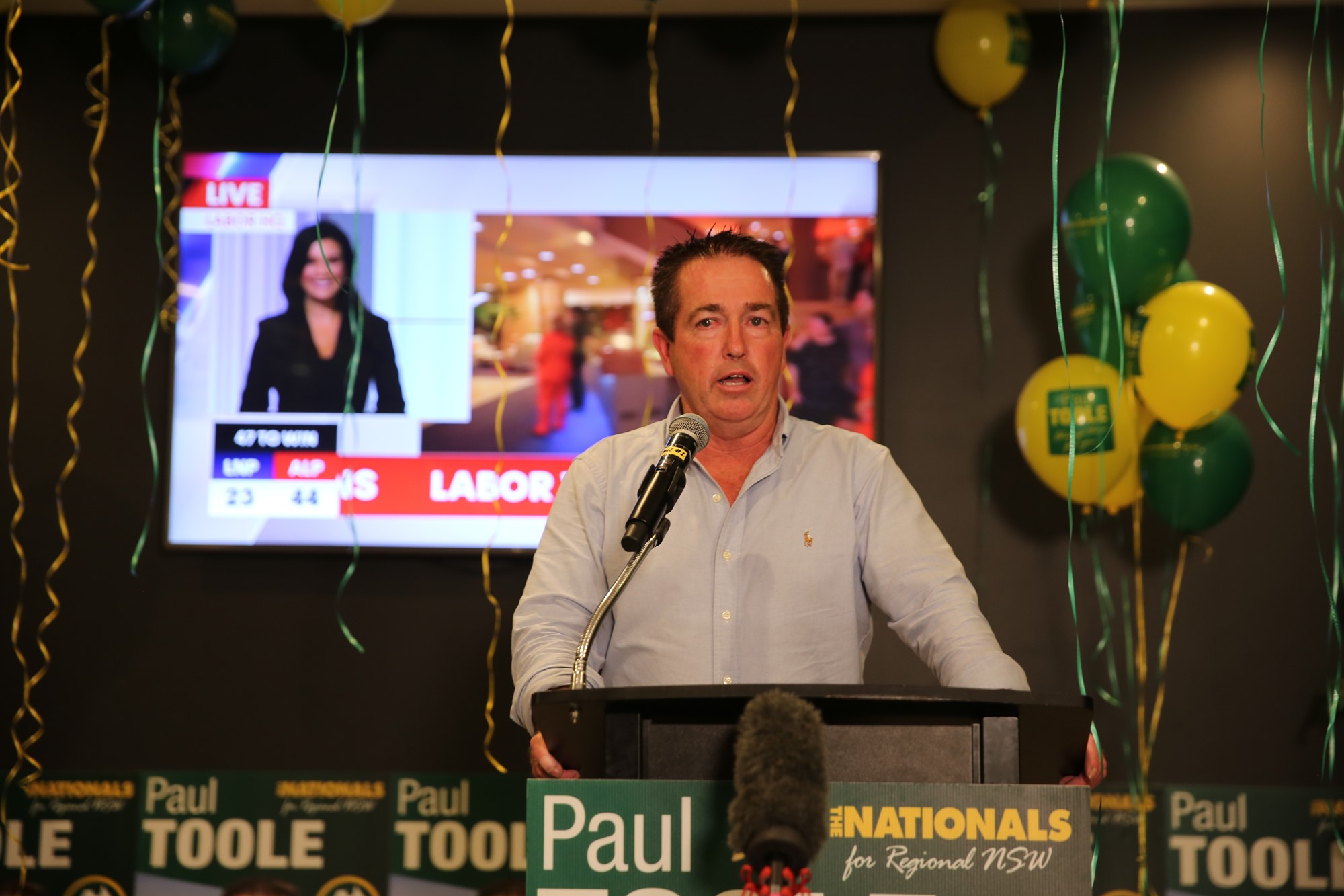 a teary Paul Toole at the podium