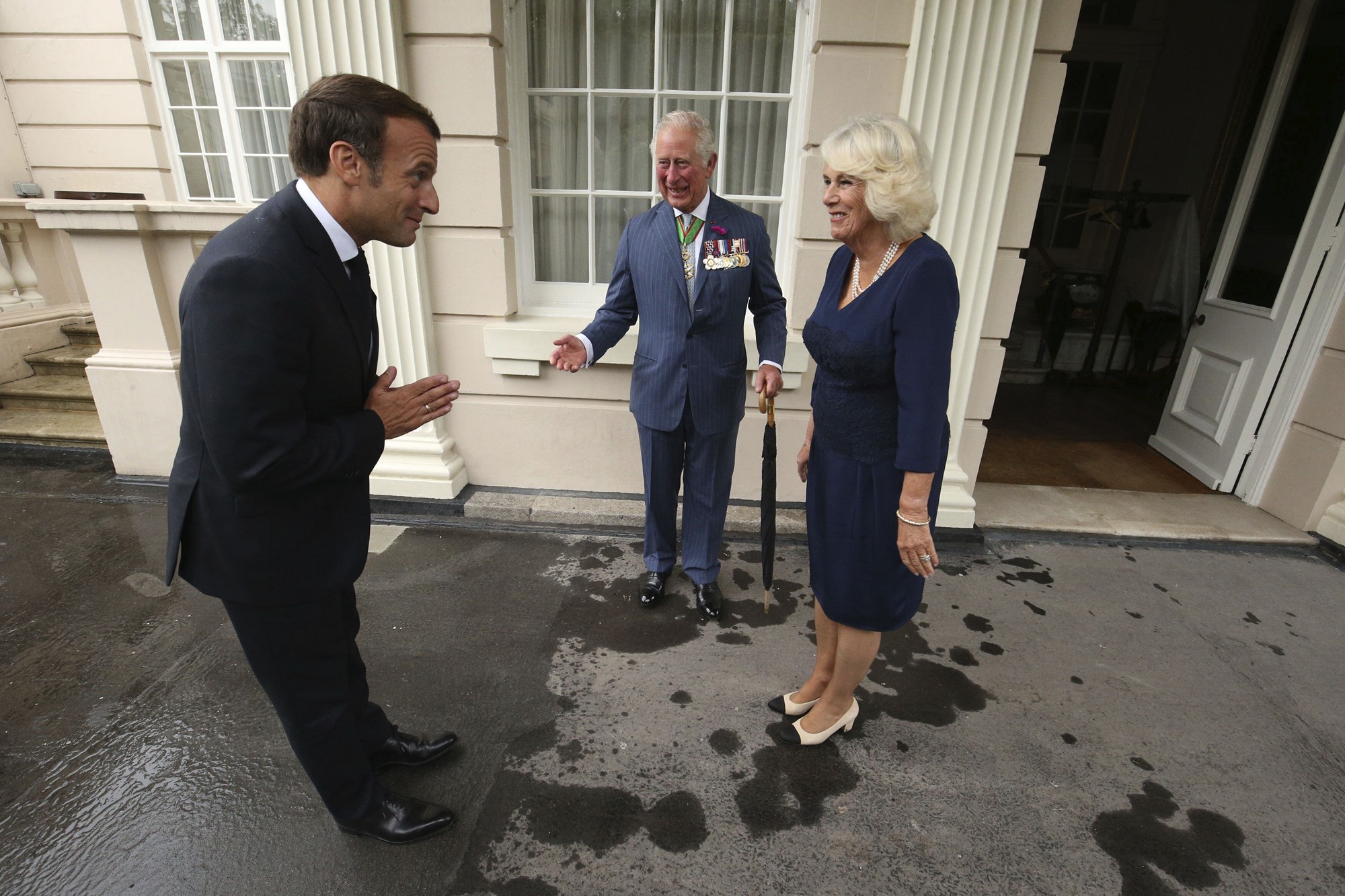 Britain's Prince Charles and Camilla with French president Emmanuel Macron.