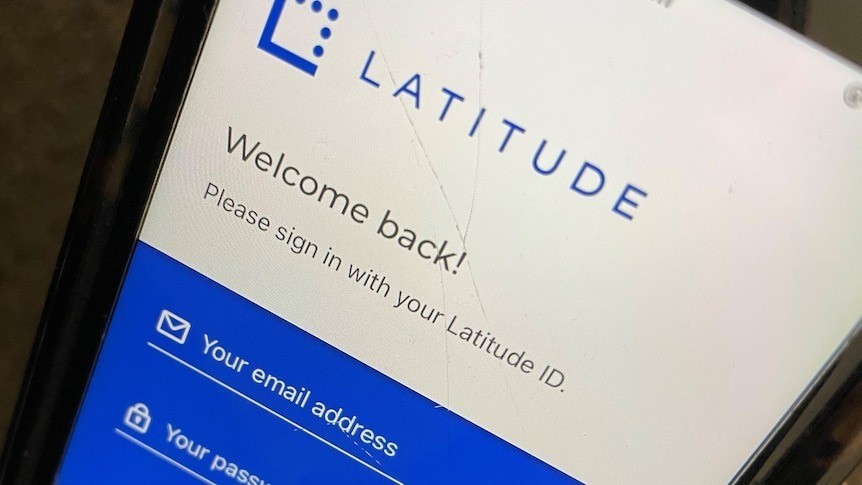 A phone screen that has the Latitude Financial website open.
