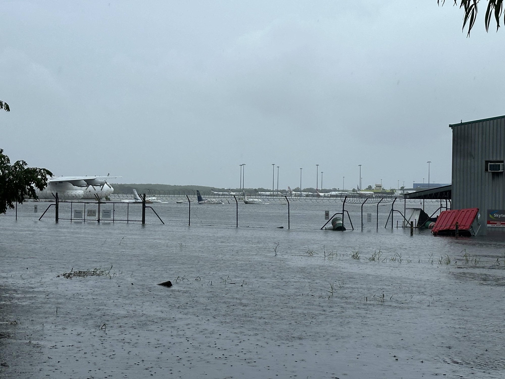 Aircraft hit by floodwaters at Cairns Airport.
