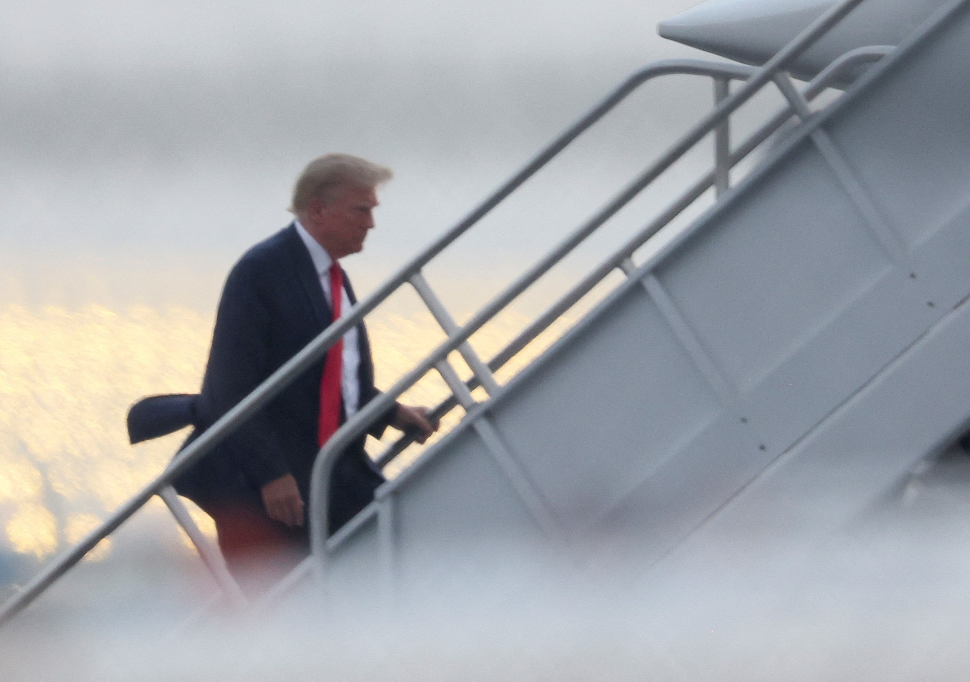 Former U.S. President Donald Trump arrives at Atlanta Hartsfield-Jackson International Airport, in Georgia