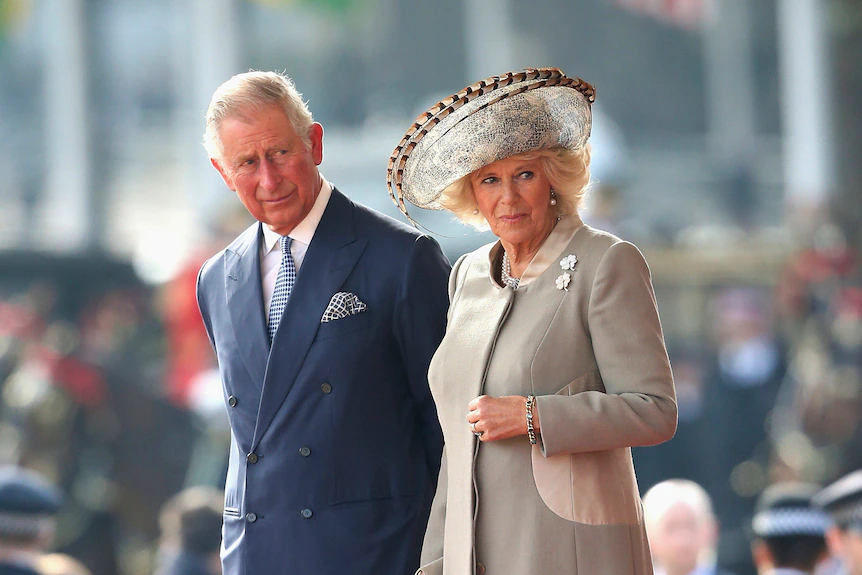 Charles and Camilla walk in public.
