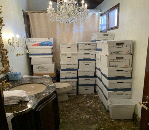 A photo published by the U.S. Justice Department in their charging document shows boxes of documents stored in a bathroom at Trump's Mar-a-Lago club in Florida in early 2021