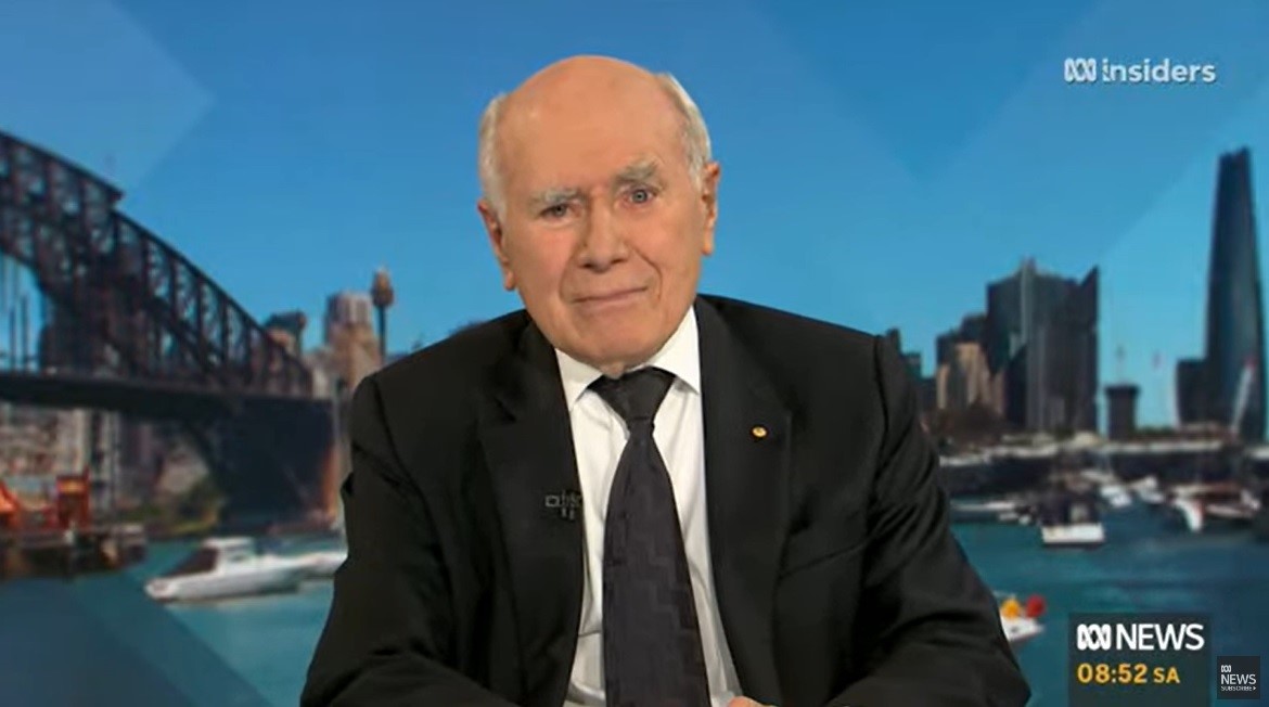 John Howard speaks on Insiders with a background on Sydney behind him.