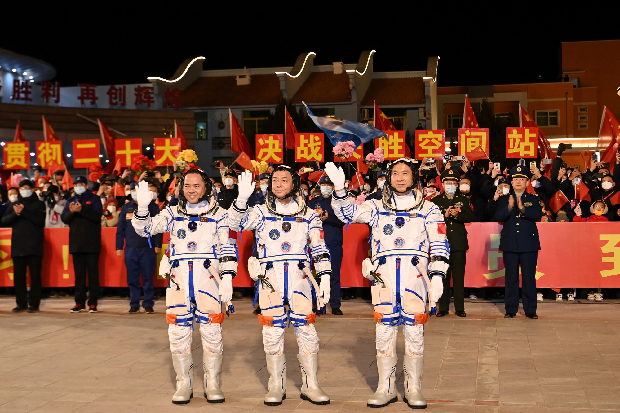Astronauts Fei Junlong, Deng Qingming and Zhang Lu attend a see-off ceremony before the Shenzhou-15 spaceflight mission to build China's space station, at Jiuquan Satellite Launch Center