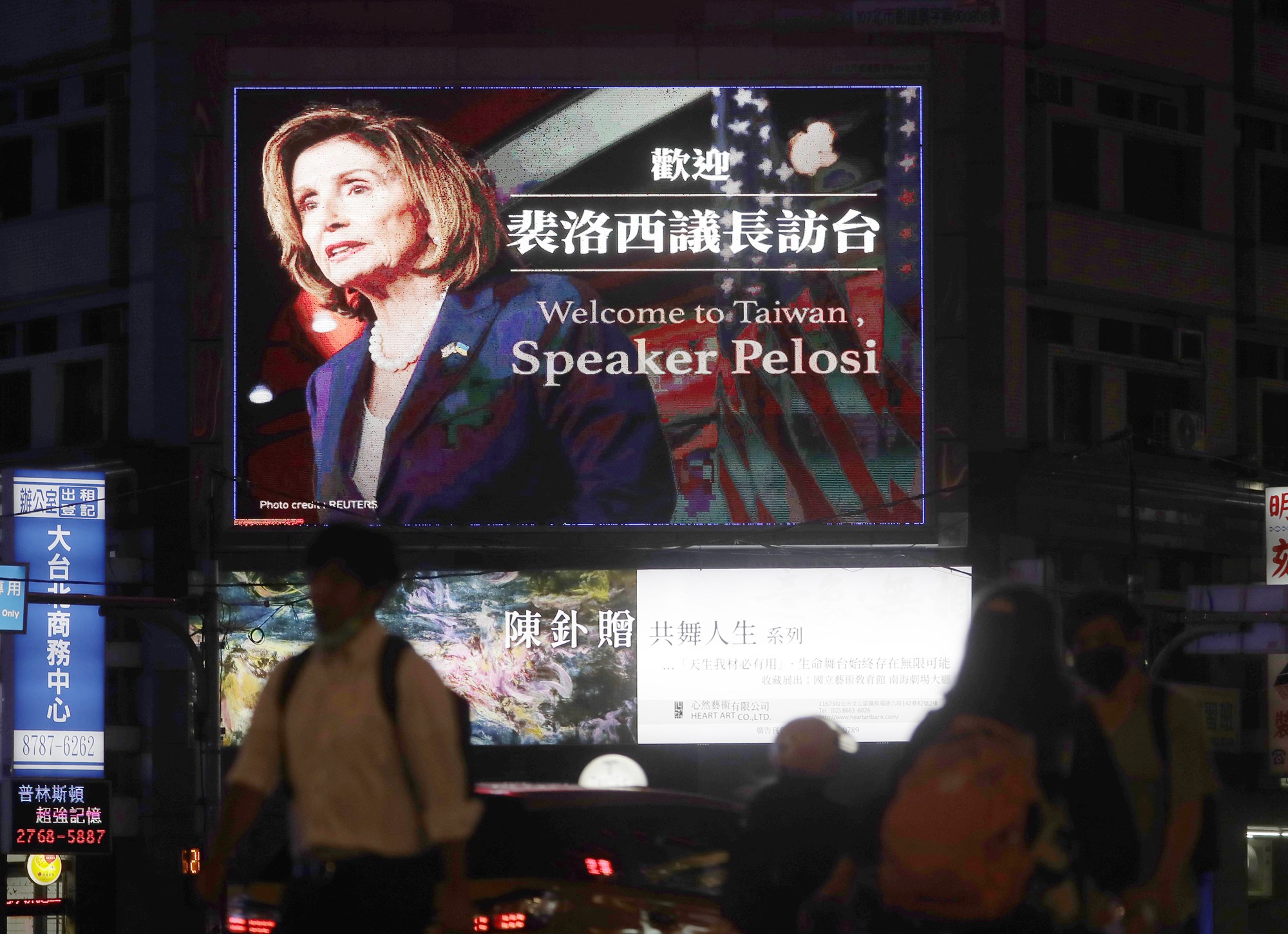 A billboard reads "welcome to Taiwan Speaker Pelosi"