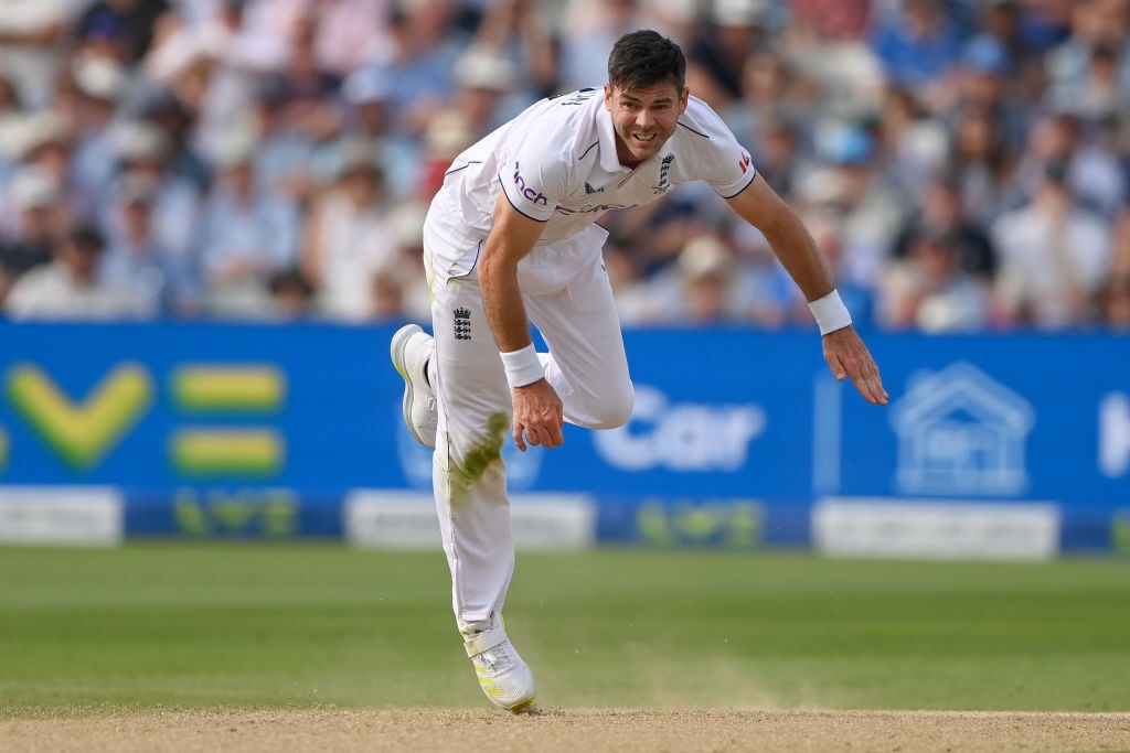 England bowler Jimmy Anderson completes his bowling action.