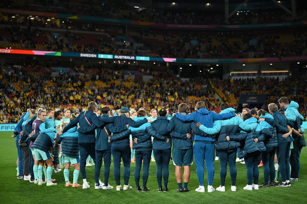 Australia players arm in arm after a match at the Women's World Cup.