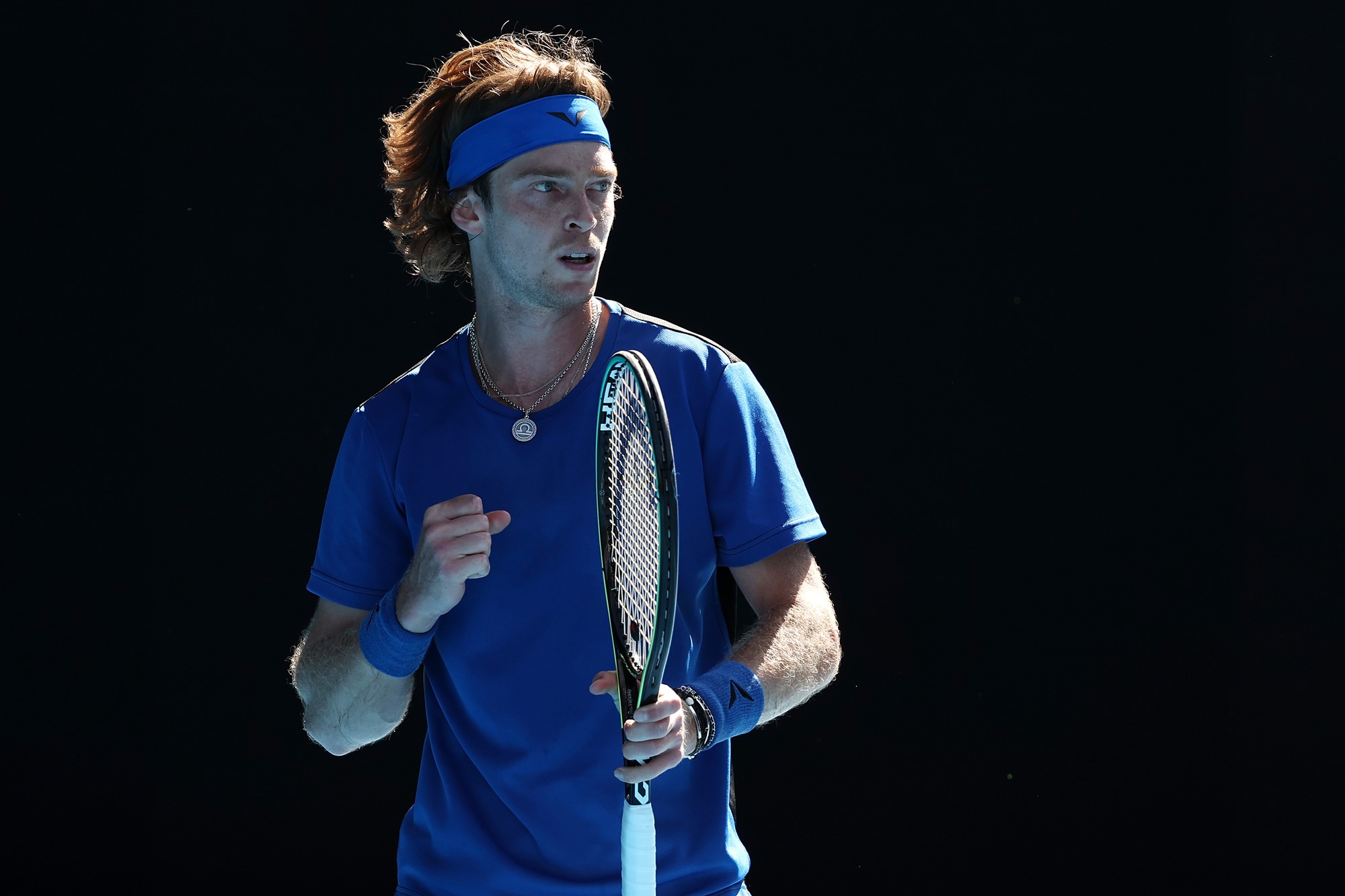 Andrew Rublev pumps his fist.