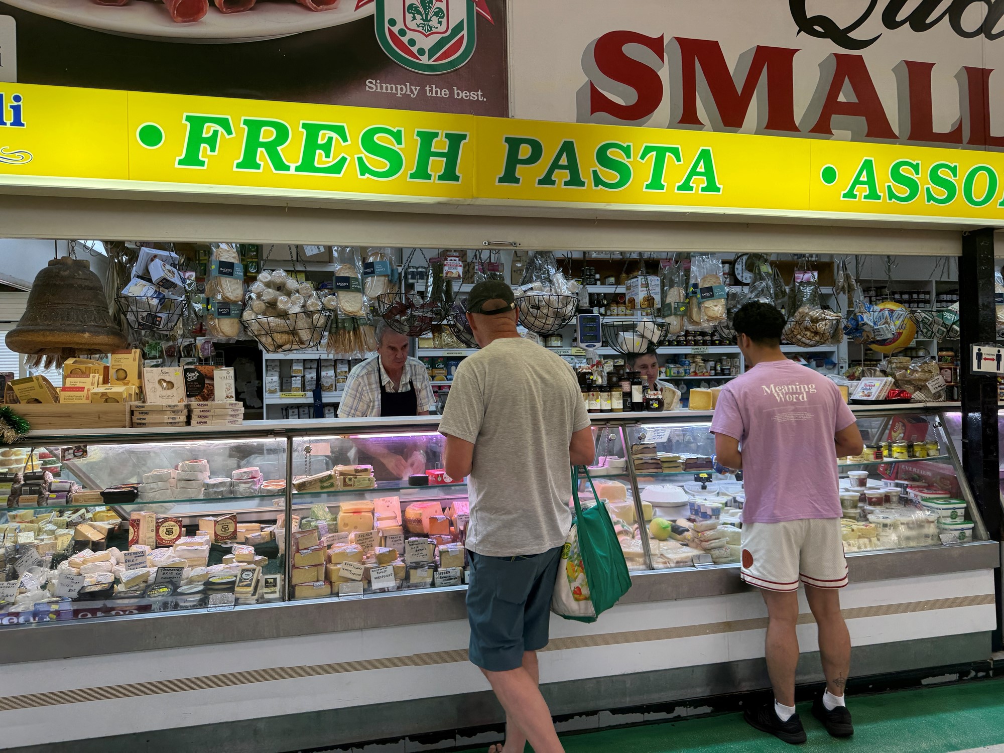 a deli with shoppers