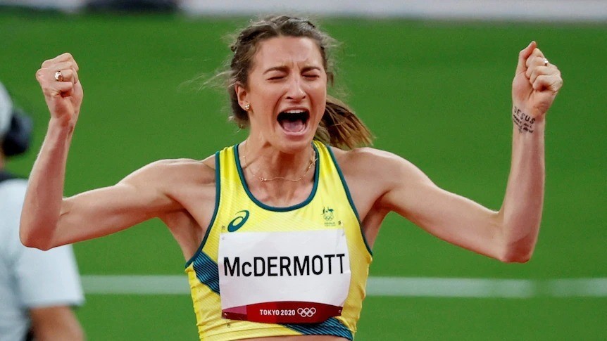 Nicola Olyslagers clenches both fists as she shouts after the Olympic high jump final.