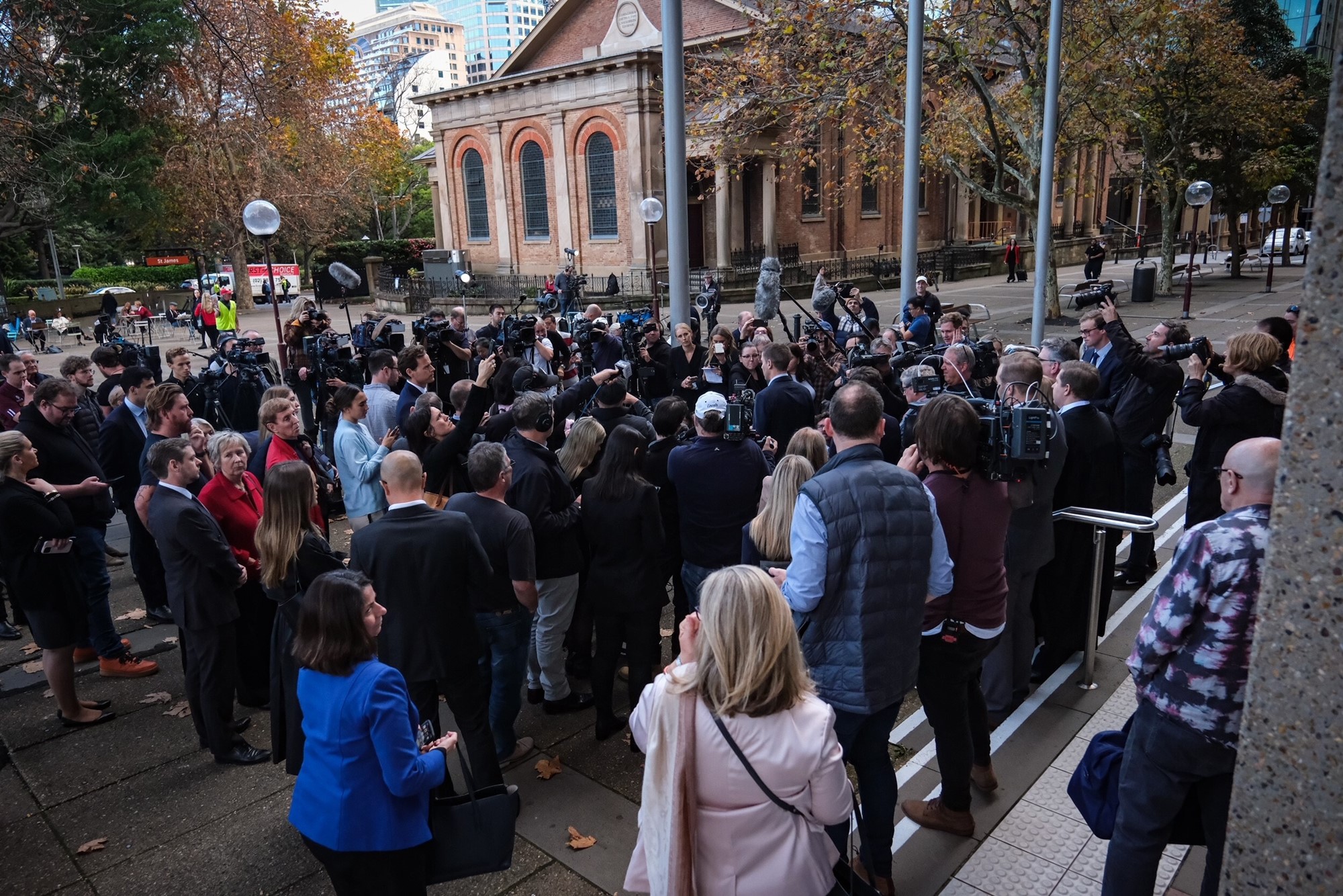 Large press pack outside court