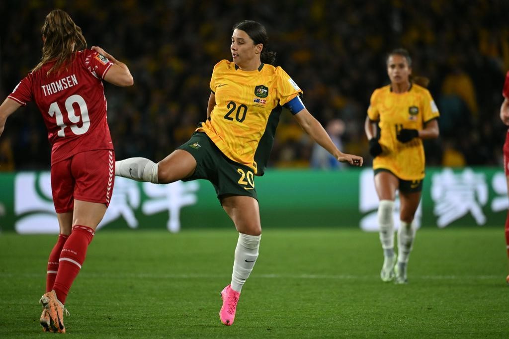 Sam Kerr touches the ball during a Women's World Cup match against Denmark.