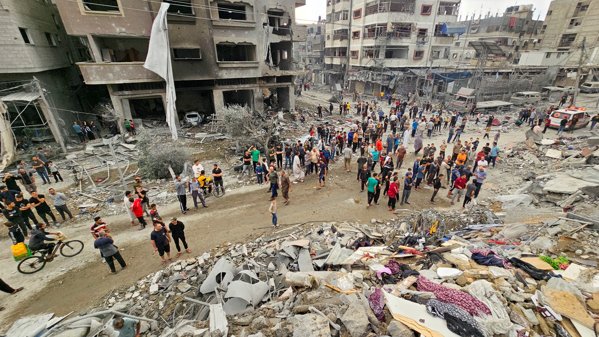 People inspect the rubble of a bombing