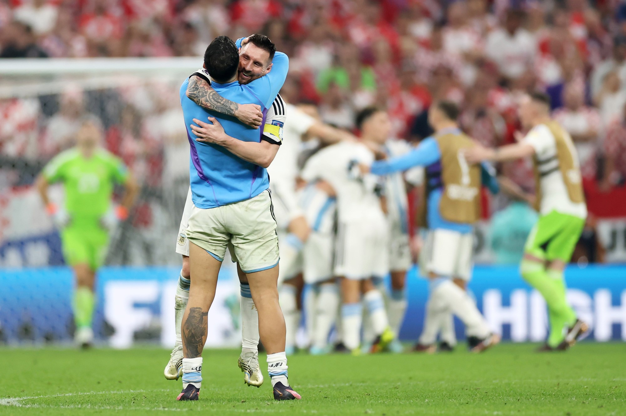Lionel Messi hugs a teammate after the FIFA WOrld Cup semifinal against Croatia.