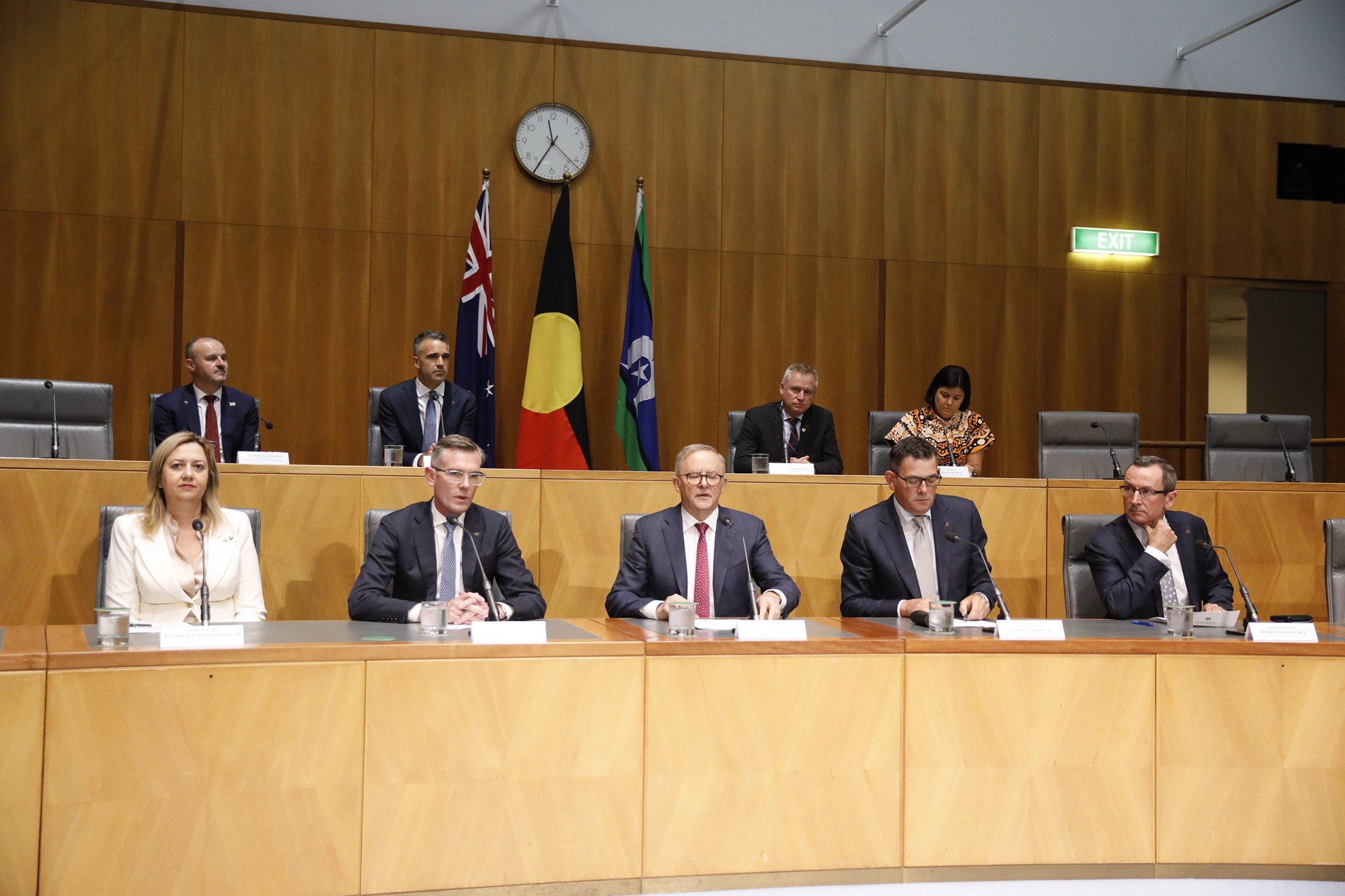 The first ministers and Anthon Ablanese sit at a press conference