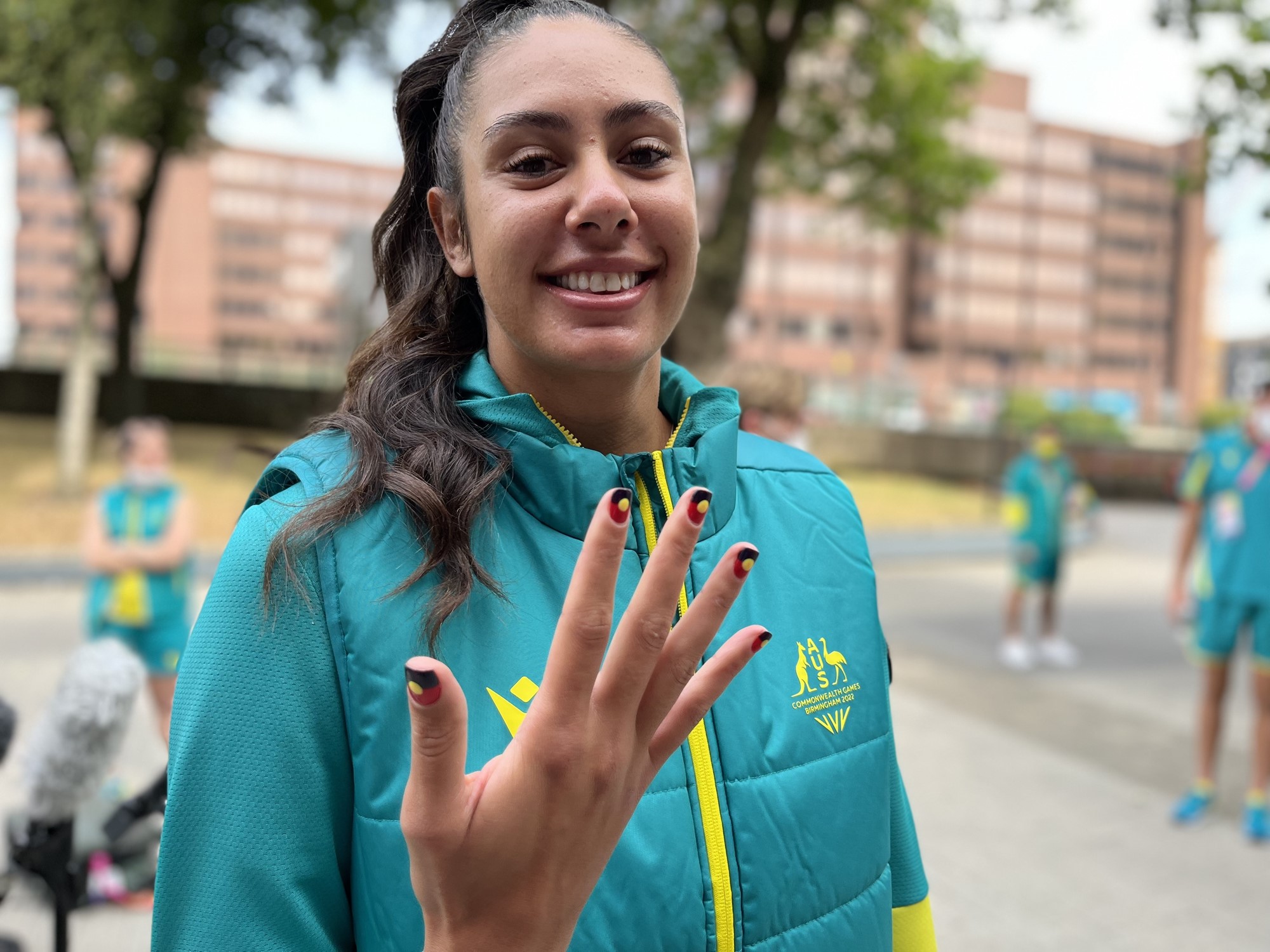 australian beach volleyballer taliqua clancy shows off her aboriginal flag print nails