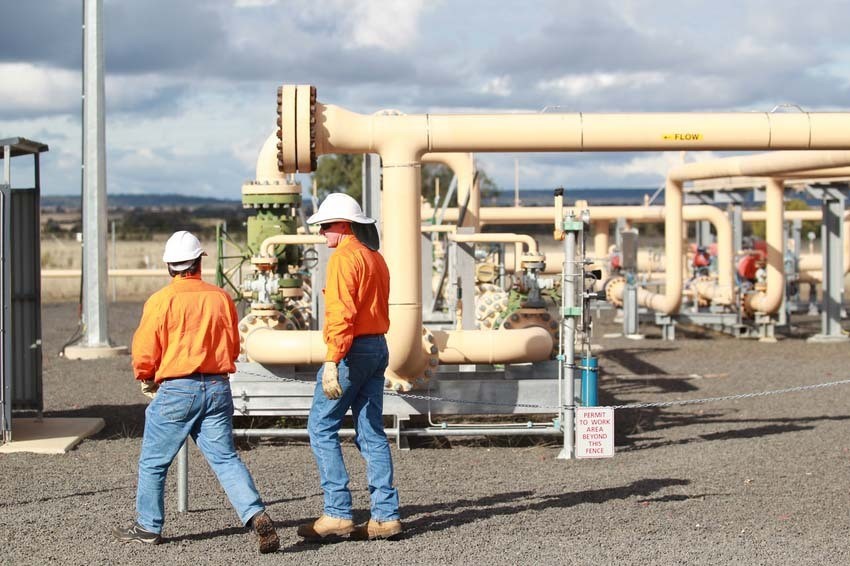 Origin Energy workers at a coal-seam gas facility at Spring Gully, in southern Queensland.