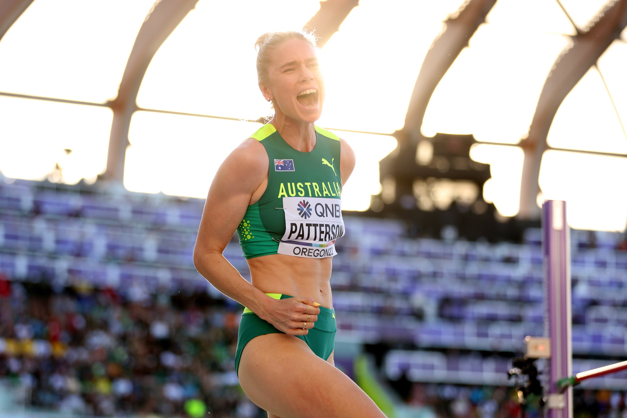 Australian Eleanor Patterson shouts with joy after clearing the bar in the world athletics championships high jump final.