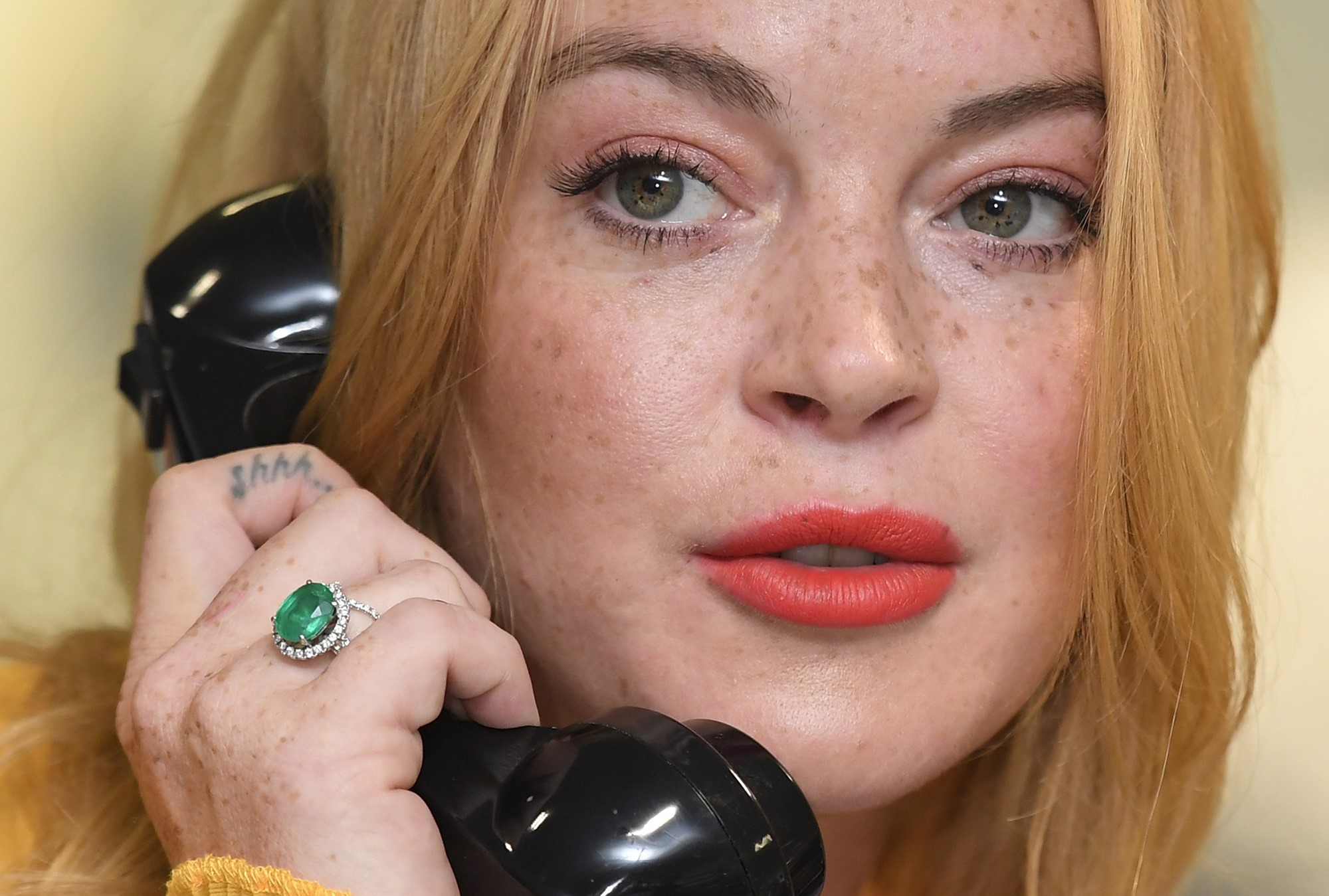 Lindsay Lohan on the phone. 