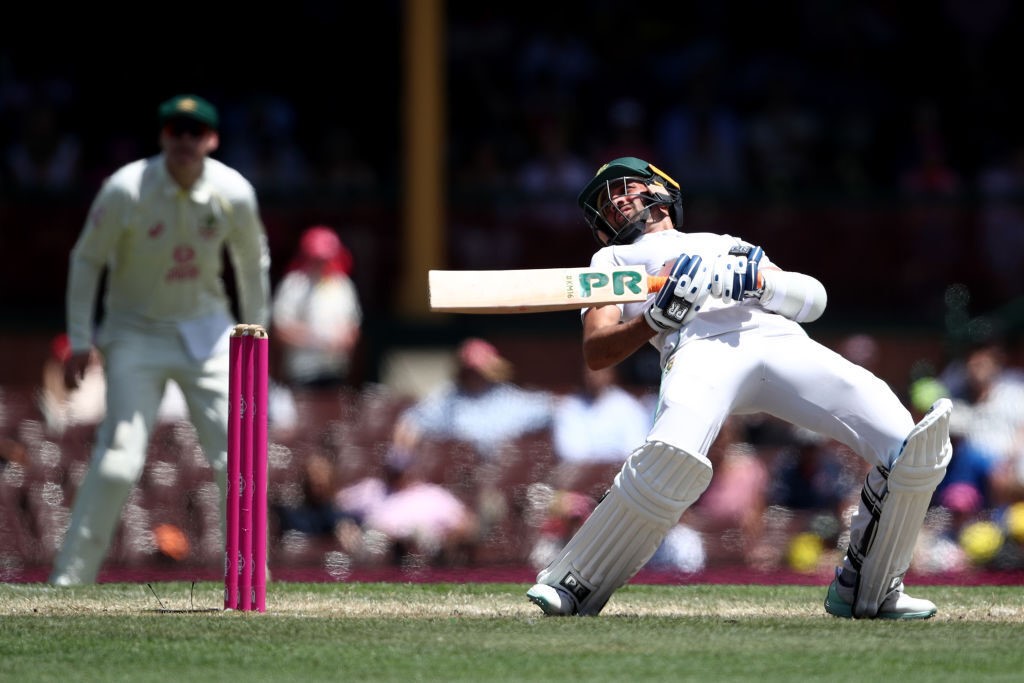 South African batsman Keshav Maharaj wobbles from the short ball from Australia on day five of the SCG Test.