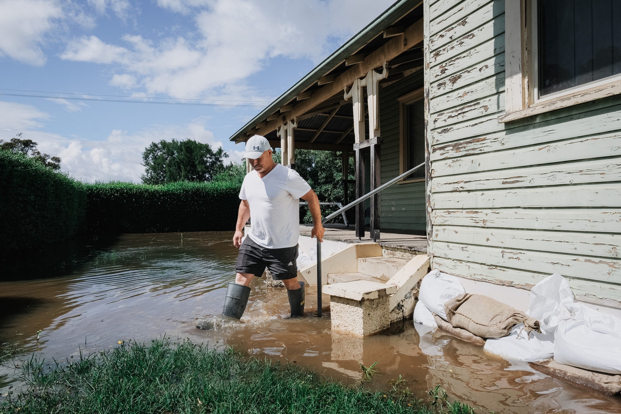 Forbes local Adam Ruperta sandbagging his home.