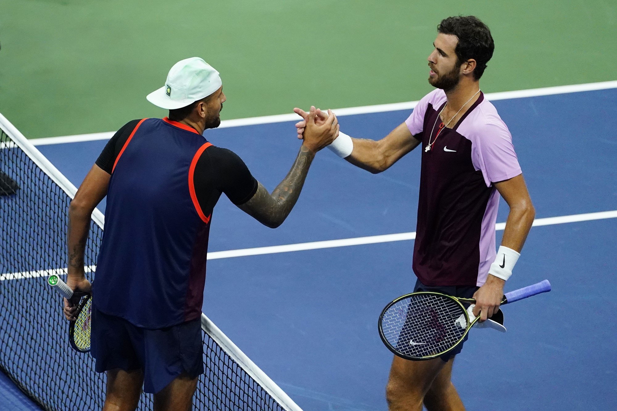 Nick Kyrgios shakes hands with Karen Khachanov after their US Open quarter-final.