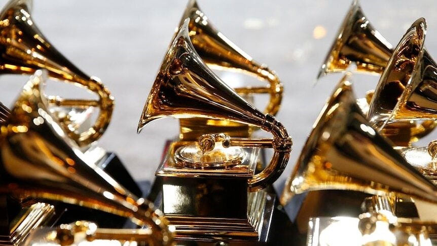 A close up of Grammy trophies.
