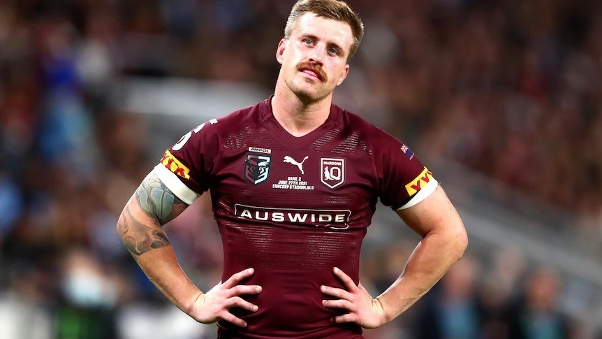 Cameron Munster of the Queensland Maroons stands with hands on hips during State of Origin.