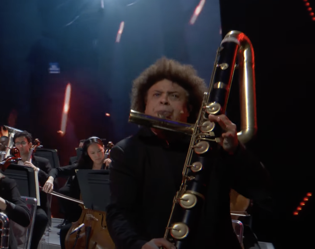 A man plays a flute at the 2023 Game Awards