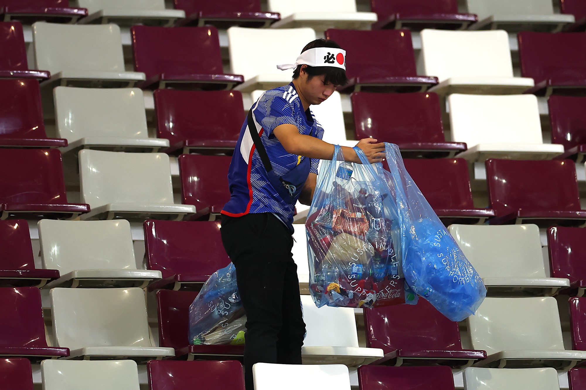 Man with a bag of rubbish