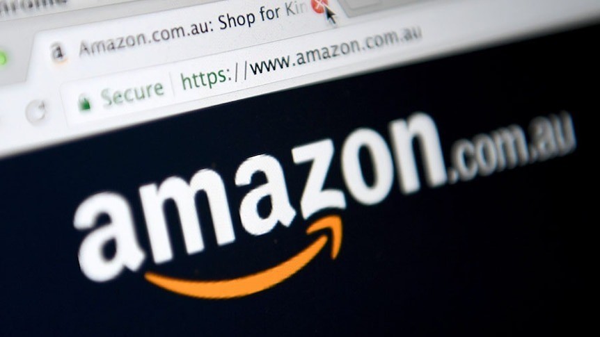 A photo of the Amazon logo on its website, shown on an internet browser.