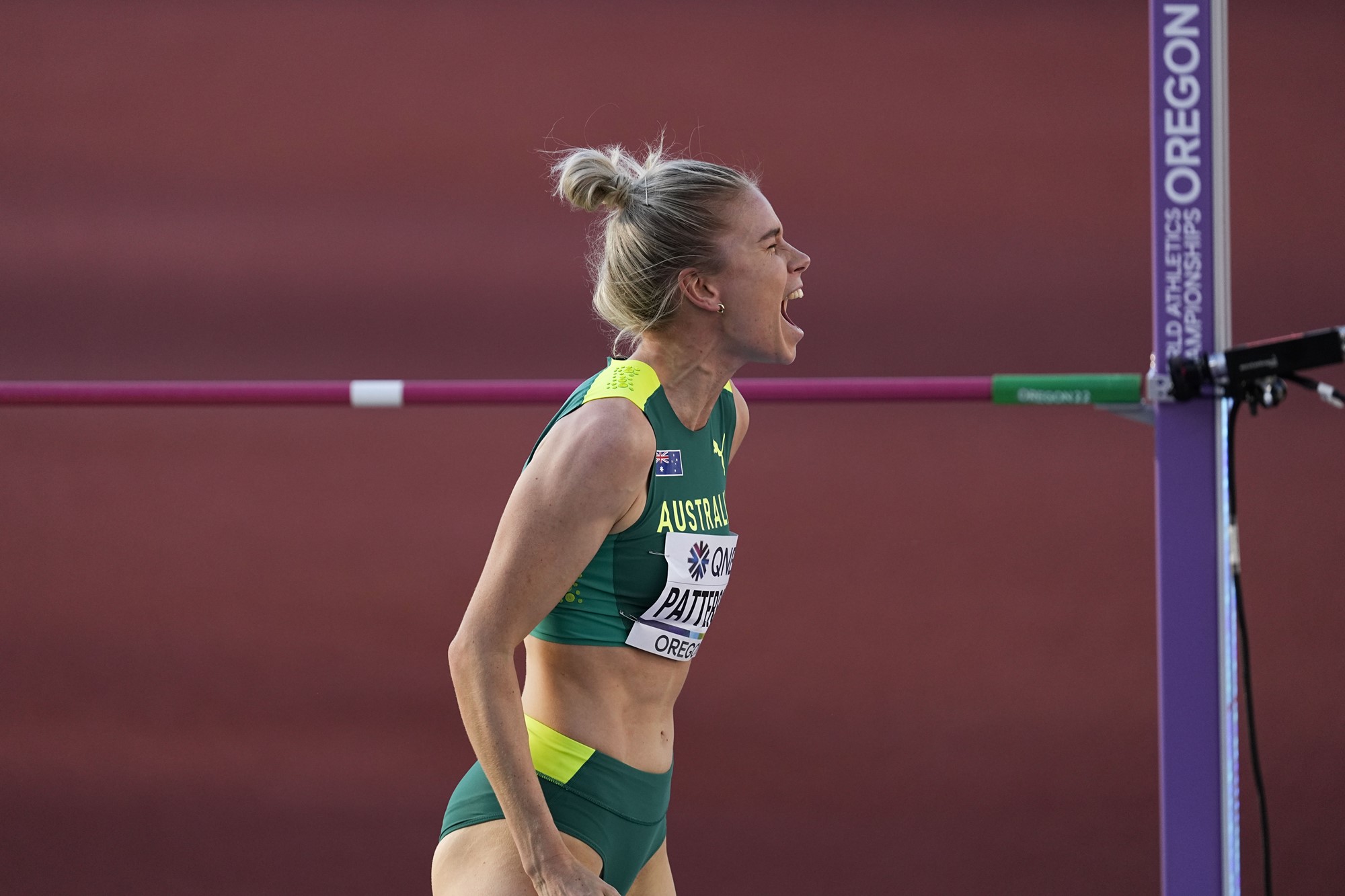 Eleanor Patterson shouts with joy after clearing the bar in the world athletics championships high jump final.