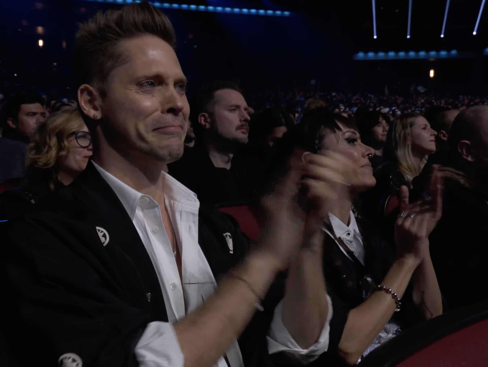 A man cries while reacting to a winner at The Game Awards