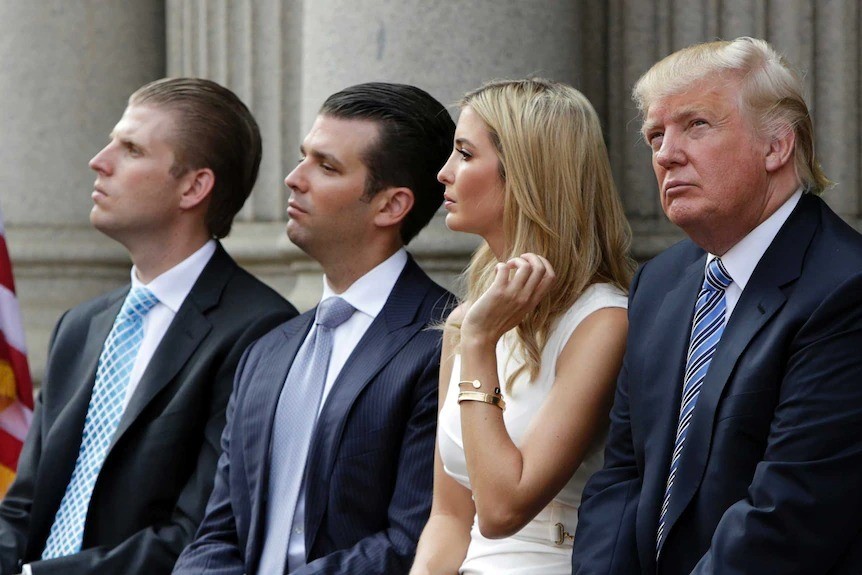 Donald Trump and his three children.