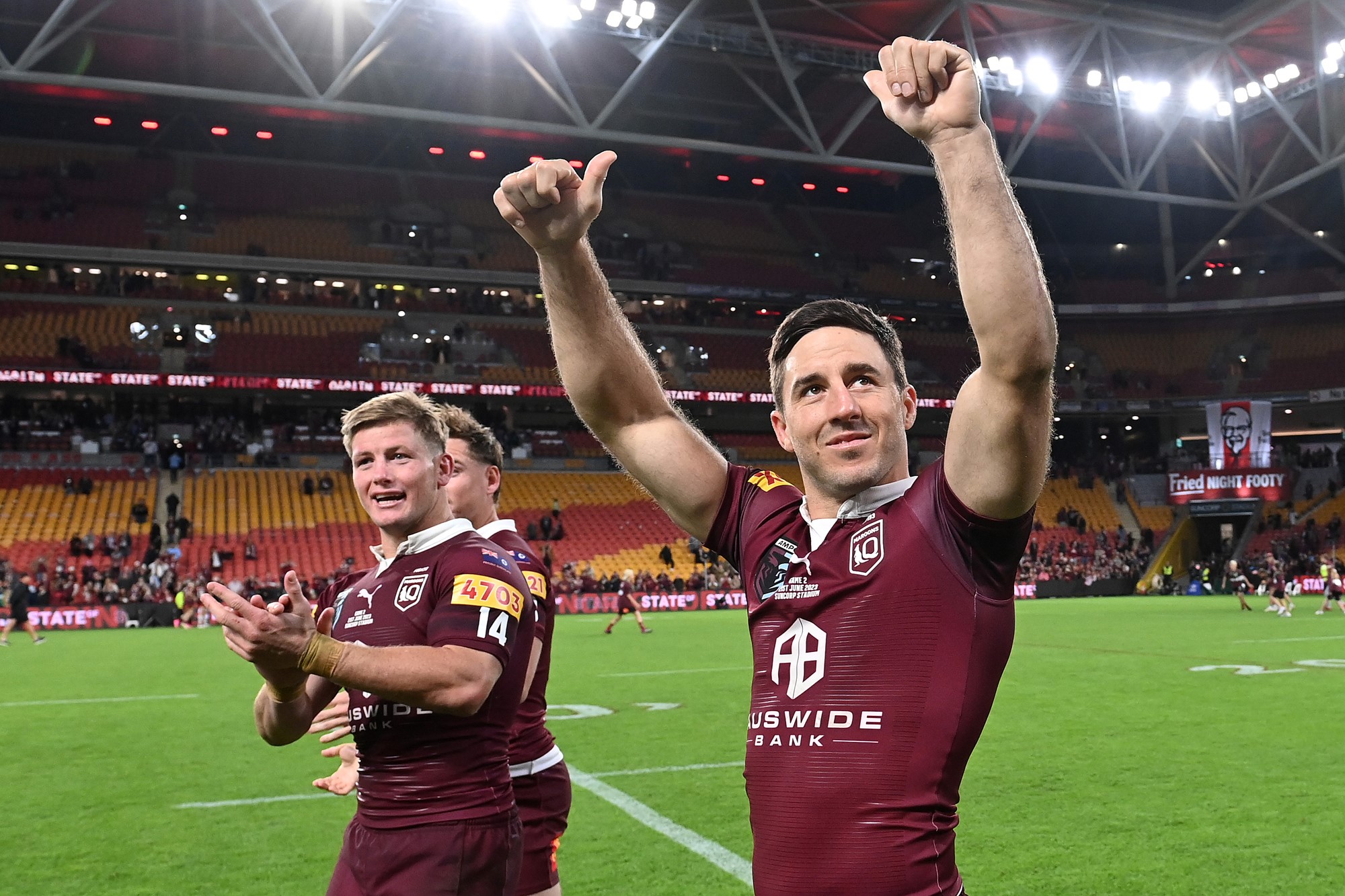 Ben Hunt and Harry Grant acknowledge the crowd after winning State of Origin II.