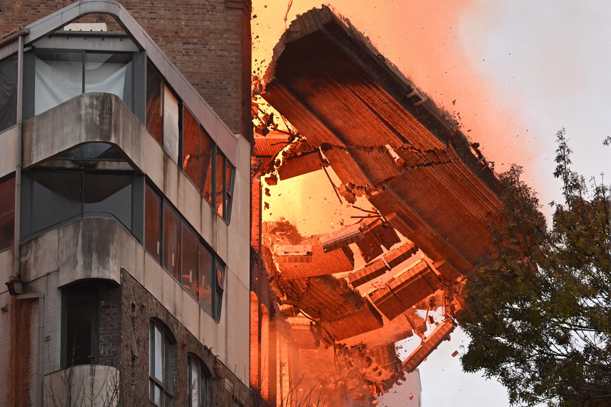 Chaos in central Sydney as massive fire engulfs building and