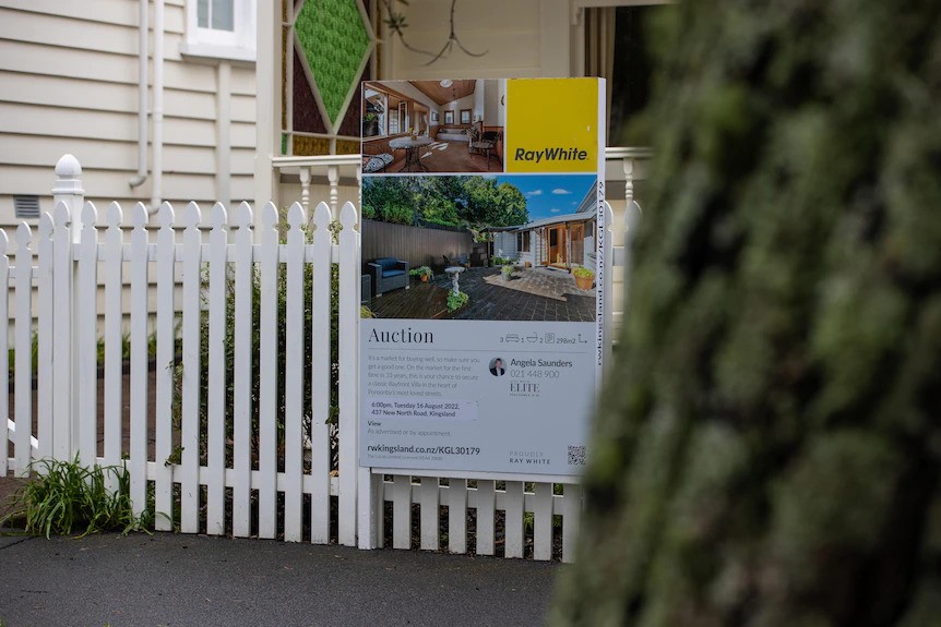 For sale sign outside an Auckland house.