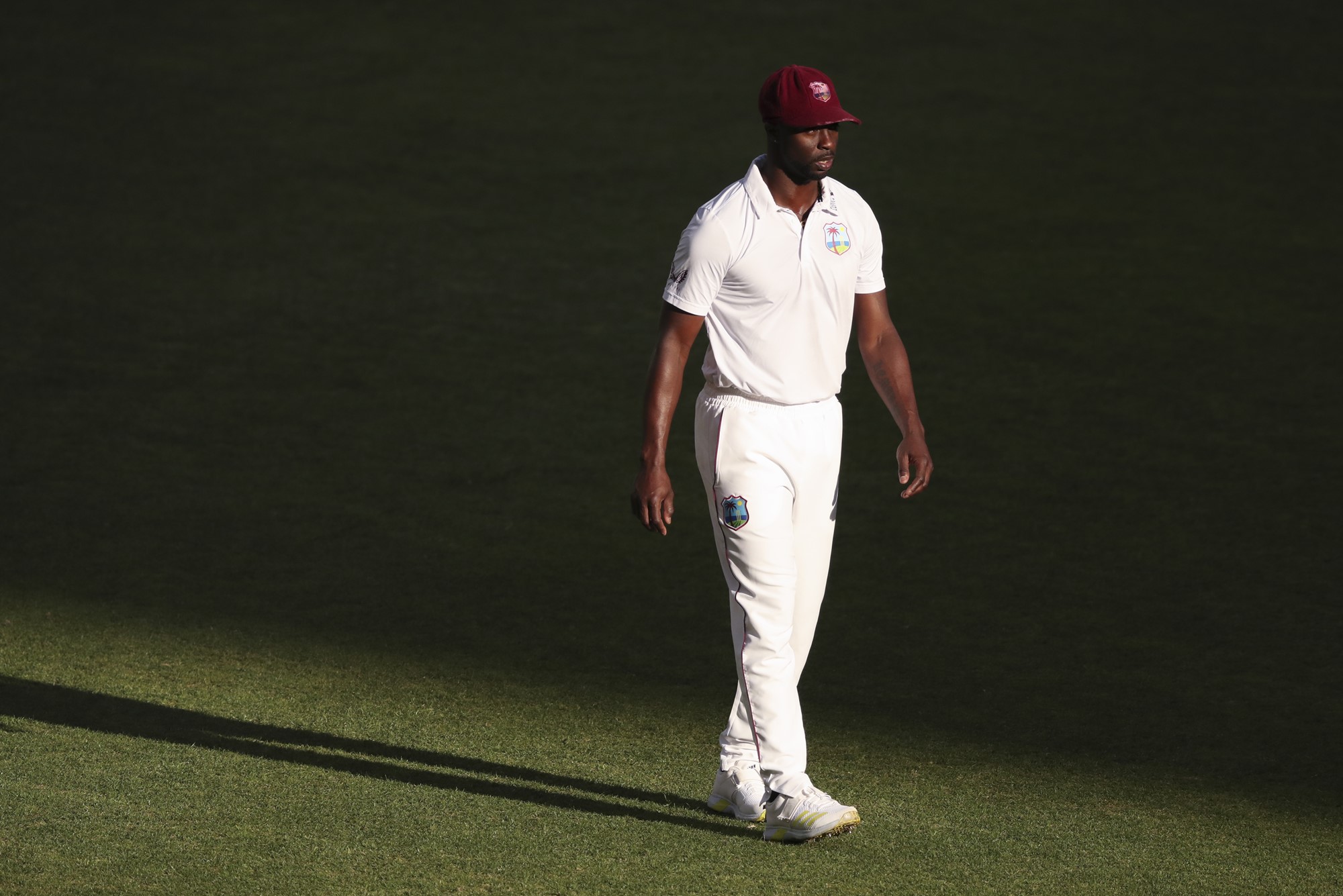 West Indies bowler Kemar Roach walks in the field during a Test against Australia.